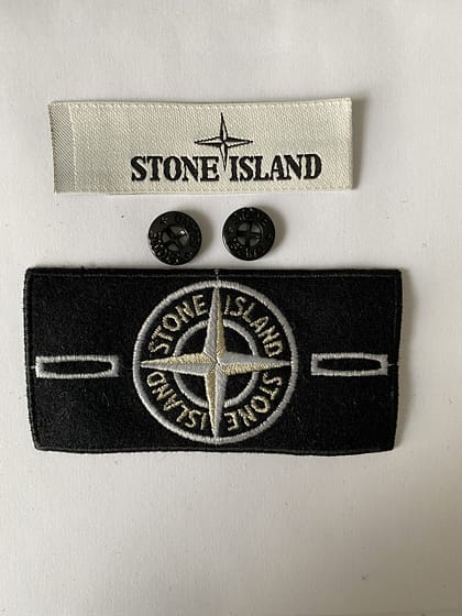 white stone island badge